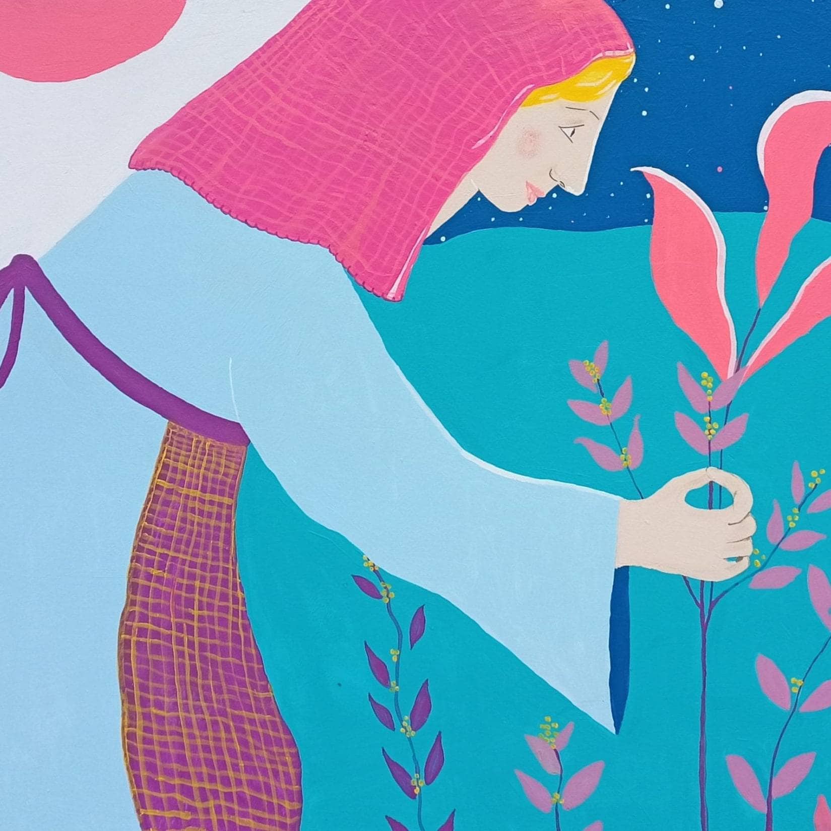Woman nurturing a plant symbolizing inner healing and self-empowerment.