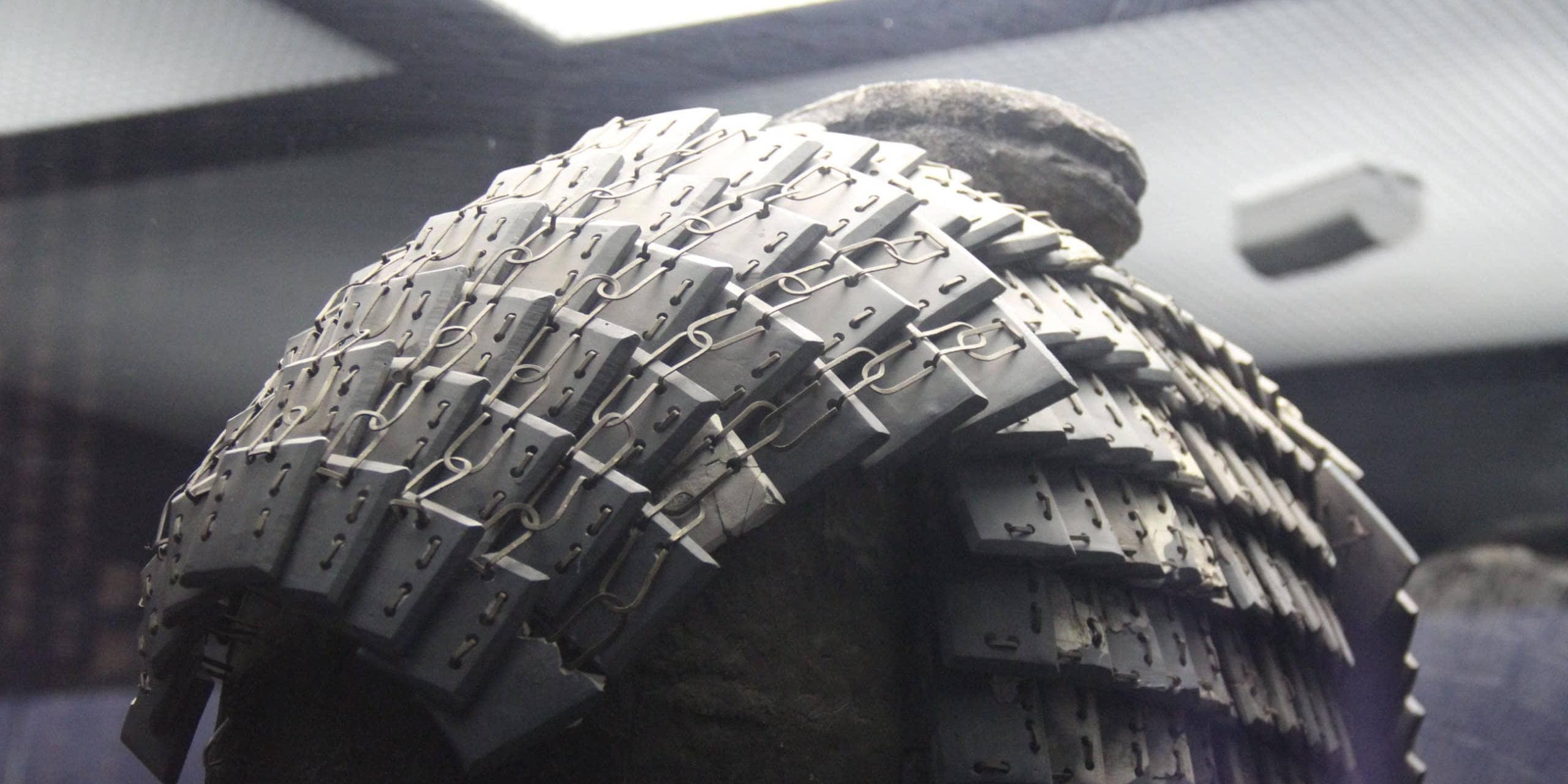 Tire with advanced metal link technology for durability and performance.