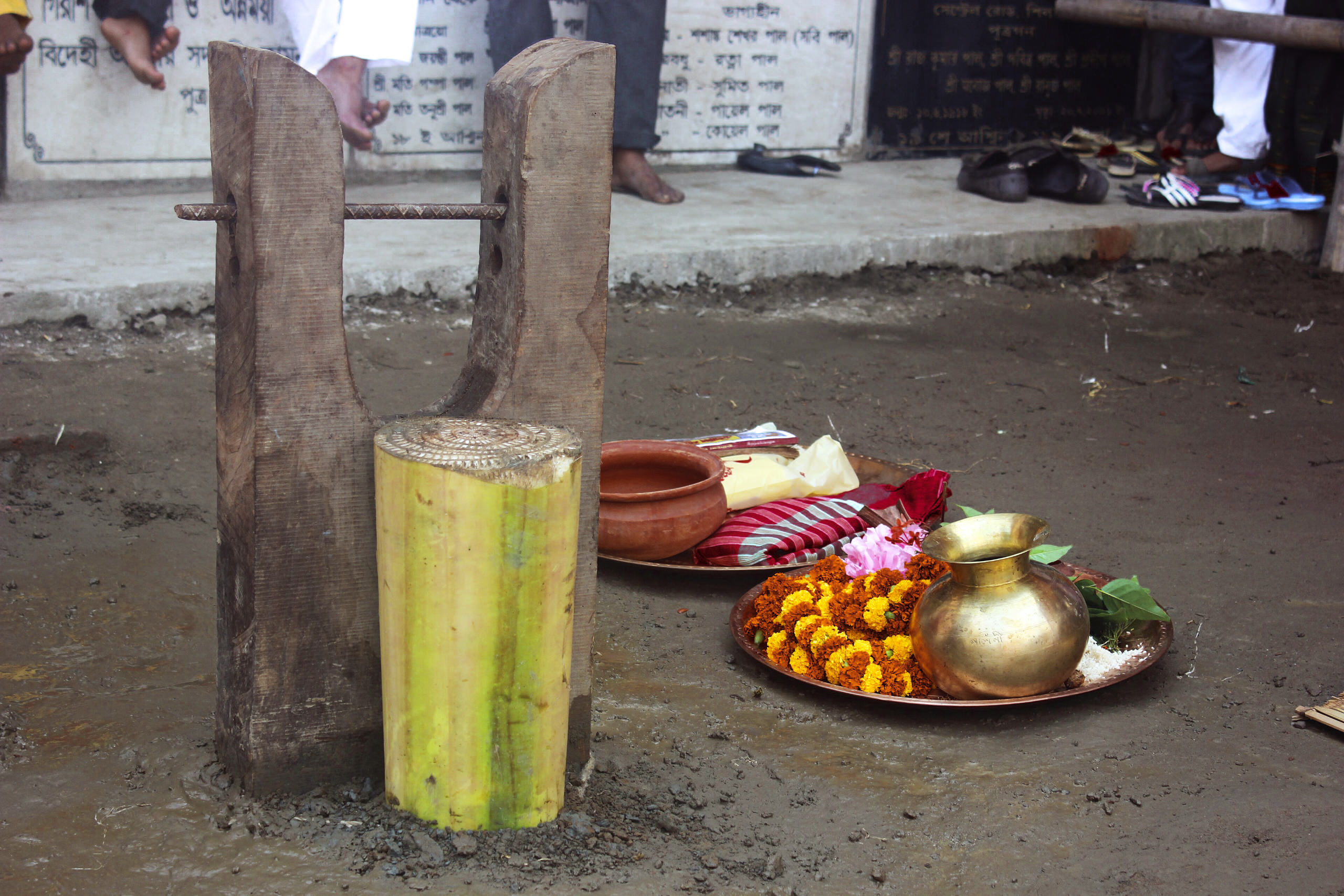 Sacred Indian shrine with offerings, flowers, and ritual items for spiritual worship.
