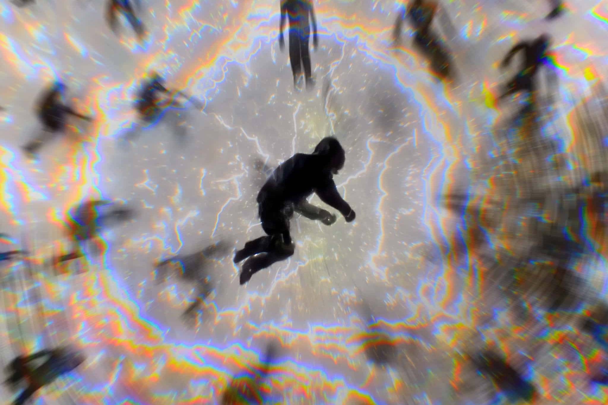 Dynamic image of a person surrounded by energetic lightning effects.