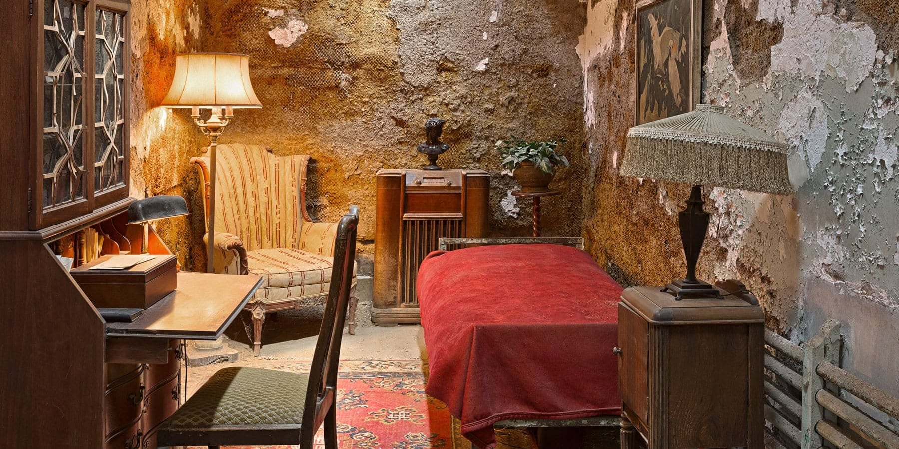 Cozy vintage room with antique furniture and rustic walls.