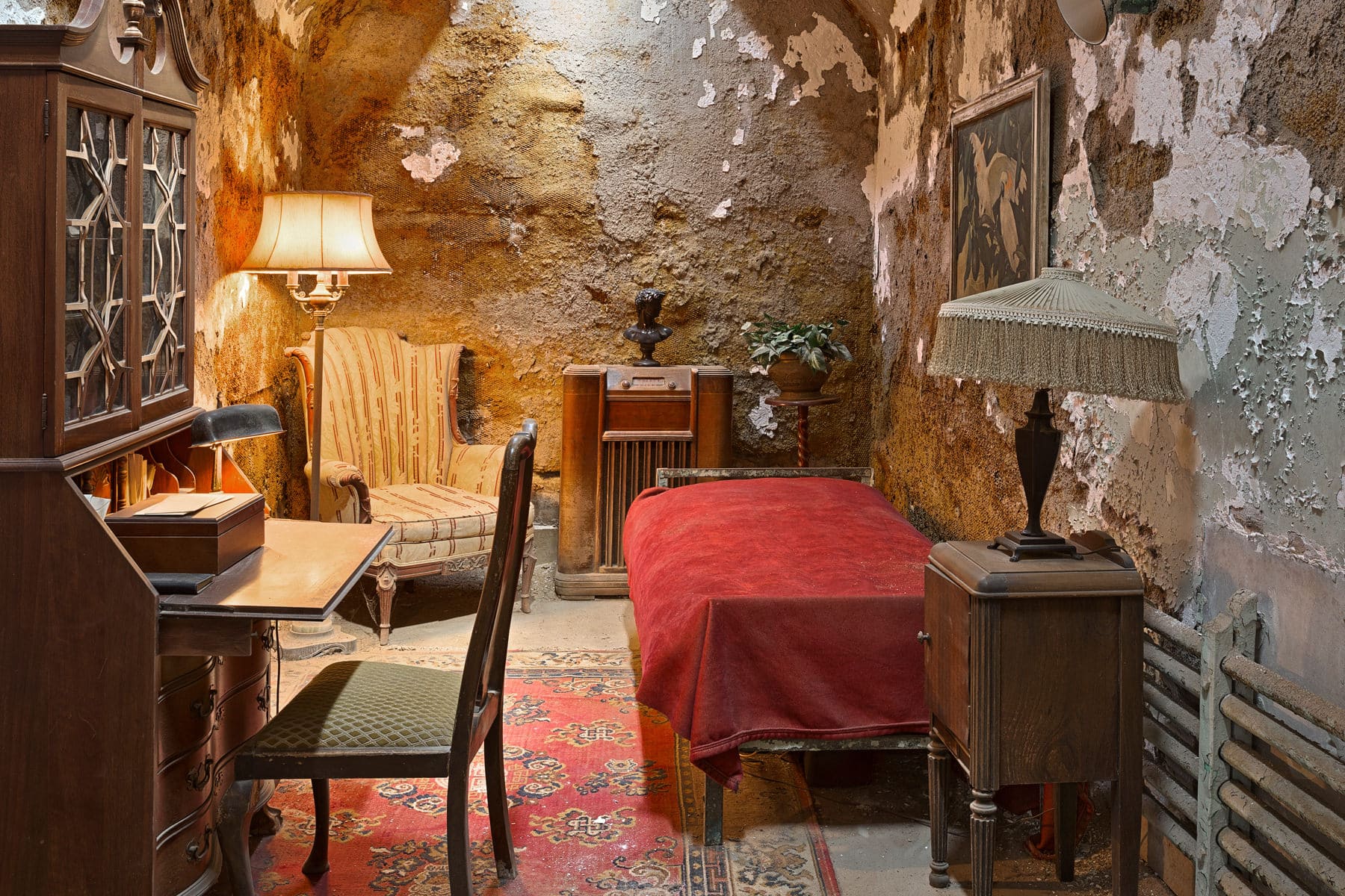 Cozy vintage room with antique furniture and rustic walls.
