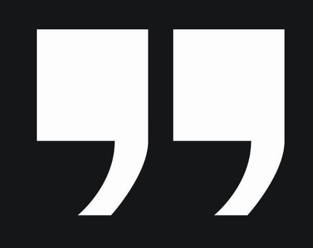 Minimalist black and white quotation mark logo for GRAINOFGOLD.