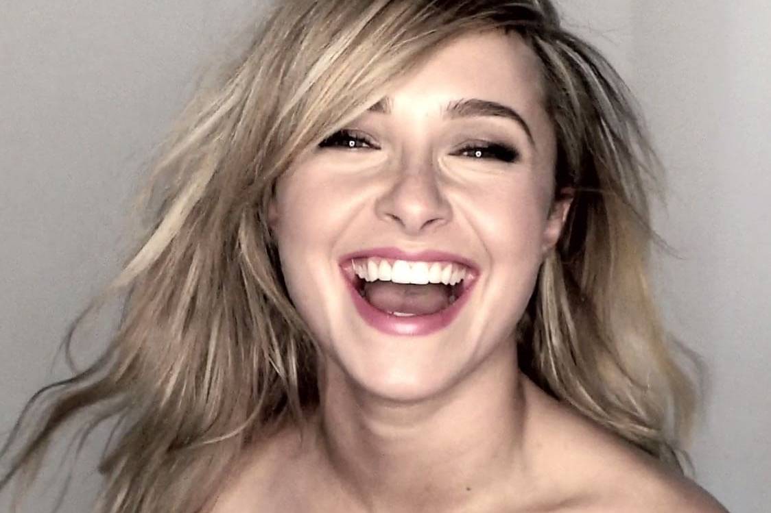 Close-up of Hayden Panettiere smiling with tousled blonde hair.