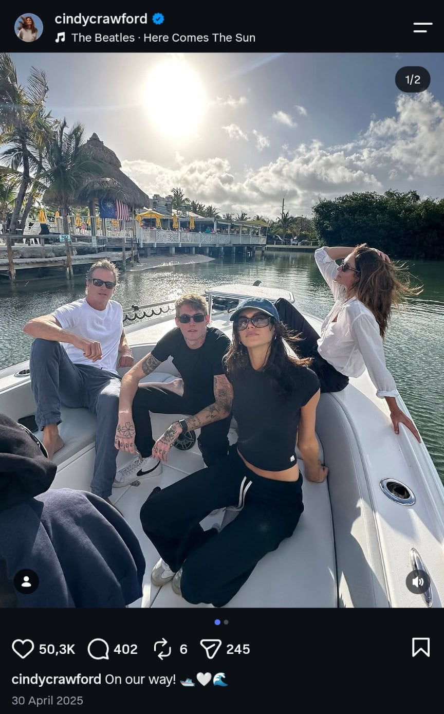 Group of friends enjoying a boat ride on a sunny day at GRAINOFGOLD.