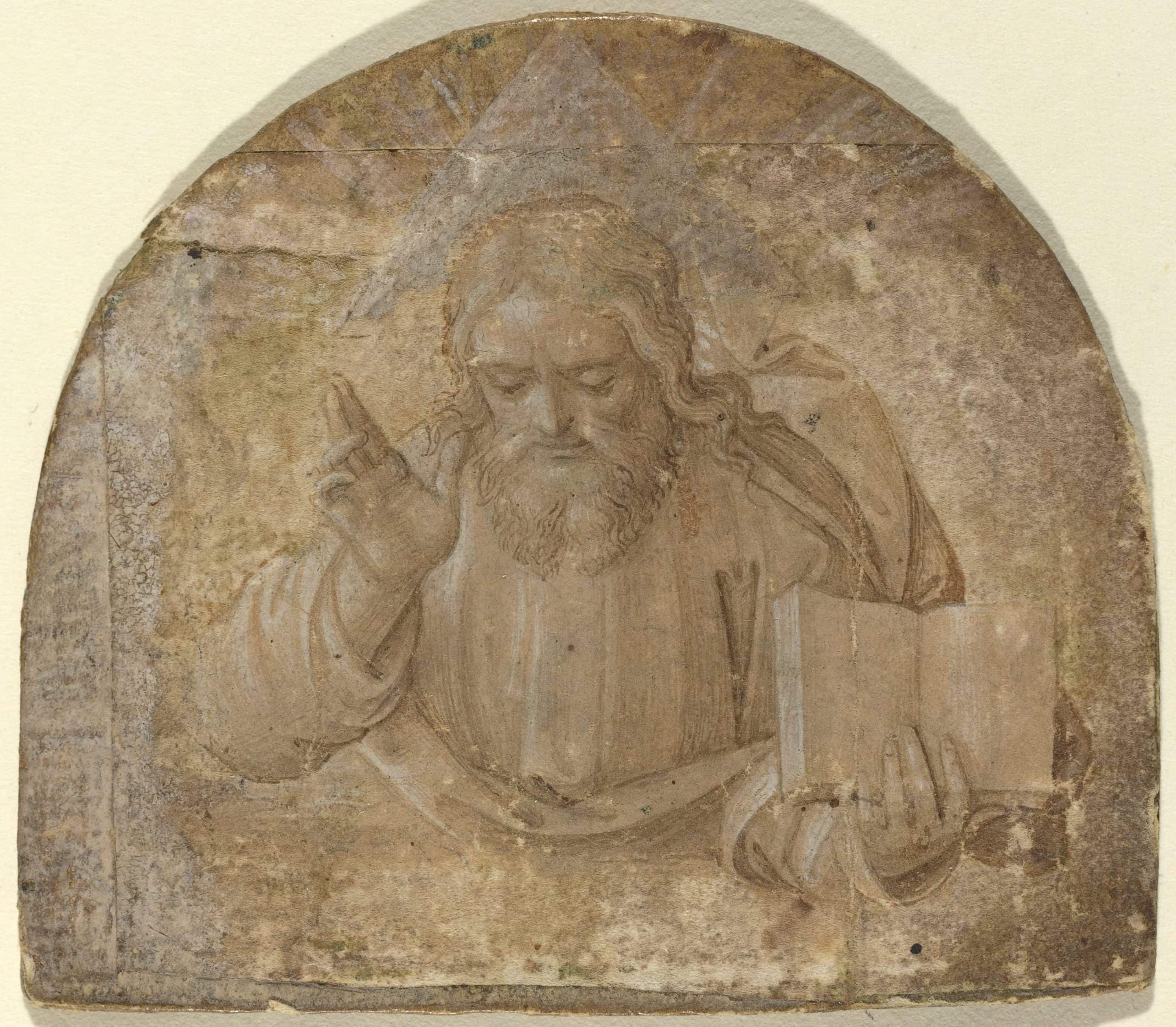 Religious stone relief depicting a bearded man with a book and gesture.