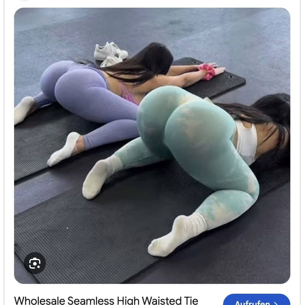 Women in colorful tie dye leggings doing yoga on mats.