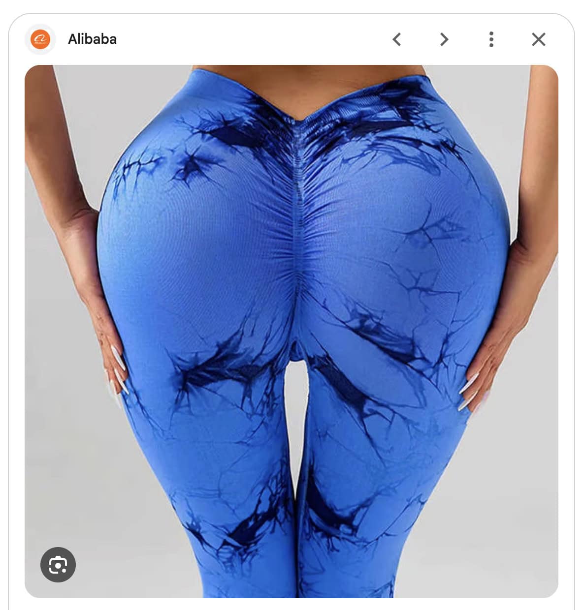 Close-up of blue tie-dye yoga pants emphasizing fit and design.
